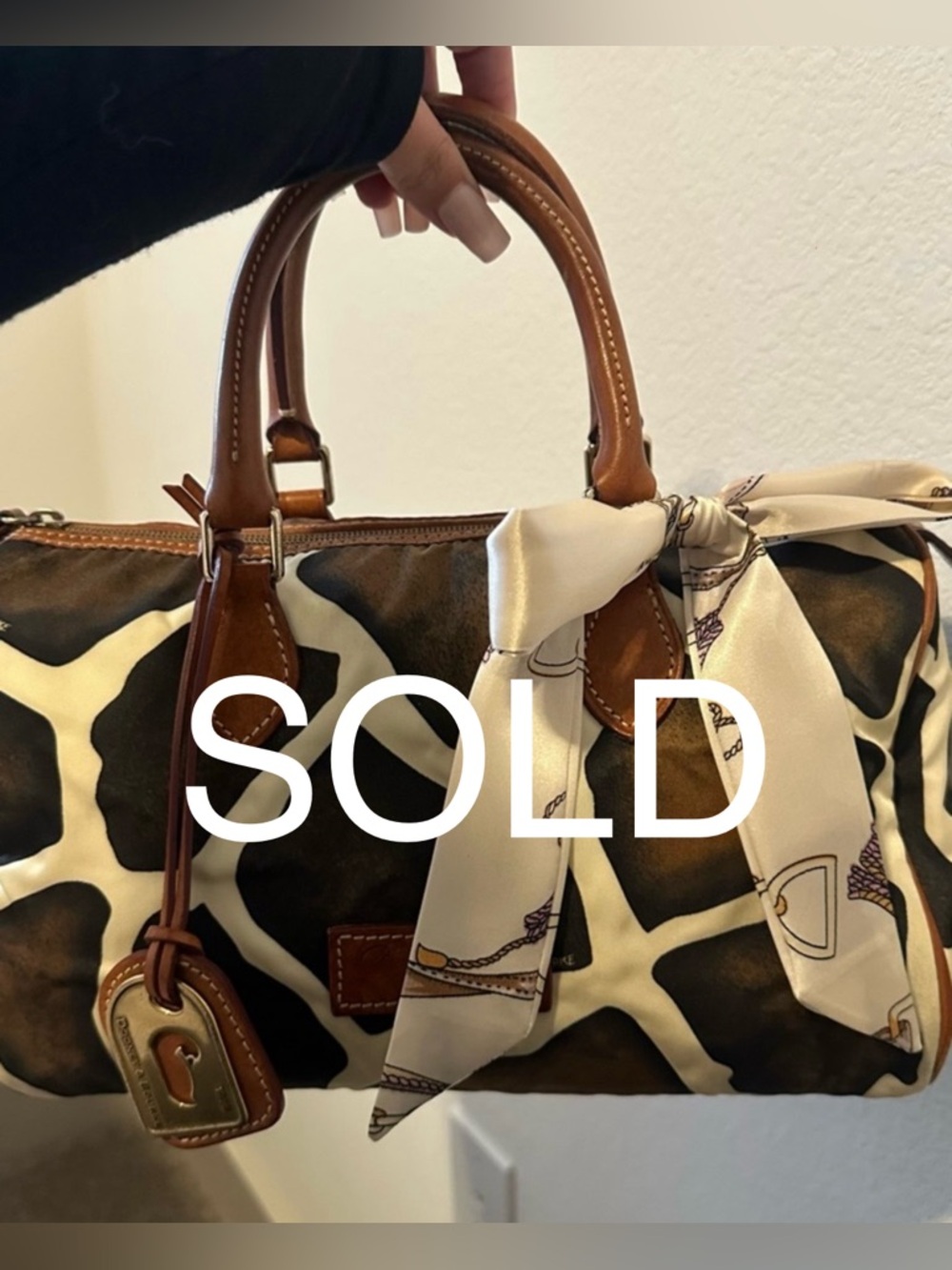 !SOLD! 
Dooney & Bourke Brown and Cream Giraffe-Print Purse